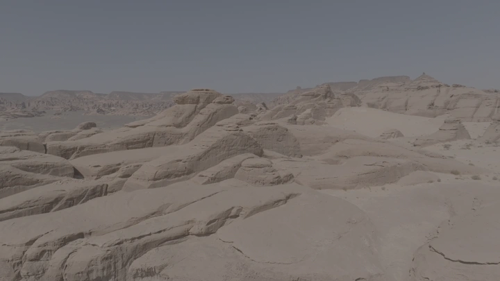 تكوينات صخرية في العلا تحت السماء الزرقاء، لقطة جوية.