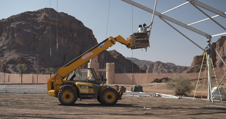 Crane at a desert construction site, daytime shot.