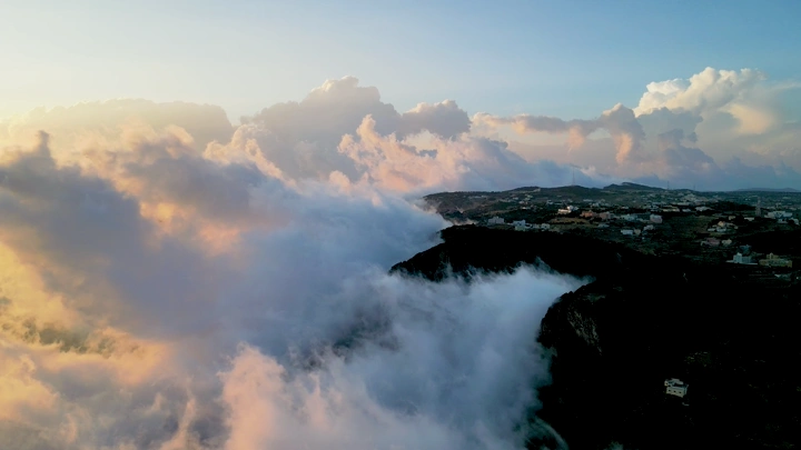 The fog covers the Al-Soudah mountains in the Asir region, an aerial shot.