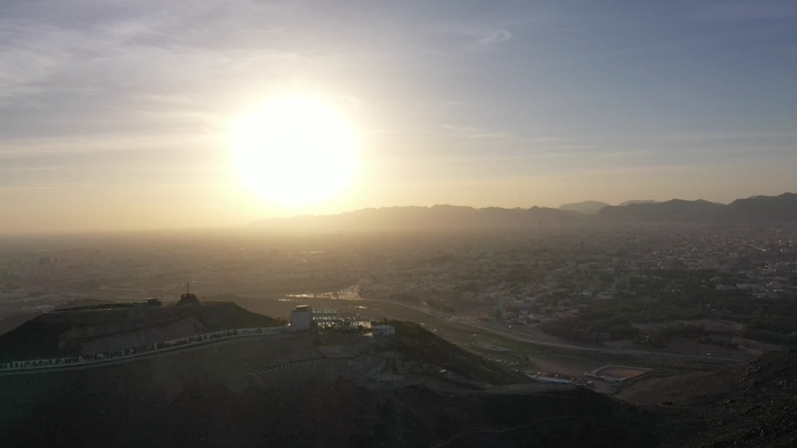 Sunset over Al-Samra Park in Hail, aerial shot.