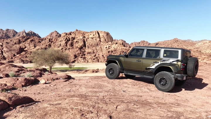 Car on a mountainous edge in Hail, daytime shot.