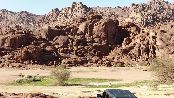 Car on a mountainous edge in Hail, daytime shot.