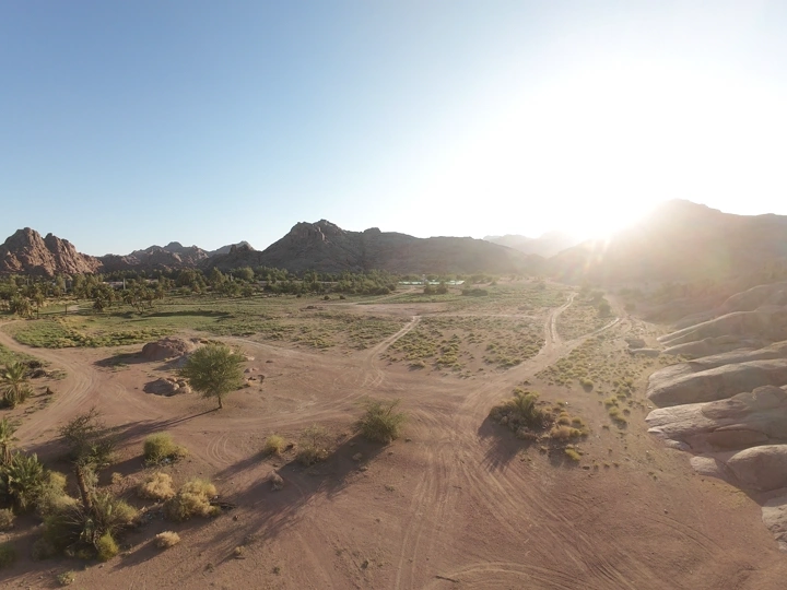 Natural landscape between Aja mountains and palm trees, aerial shot.